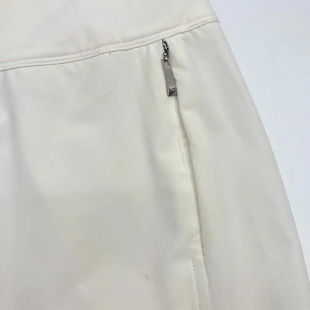 UEC Jofit essential golf skort white size “2” equivalent small tag cut out
